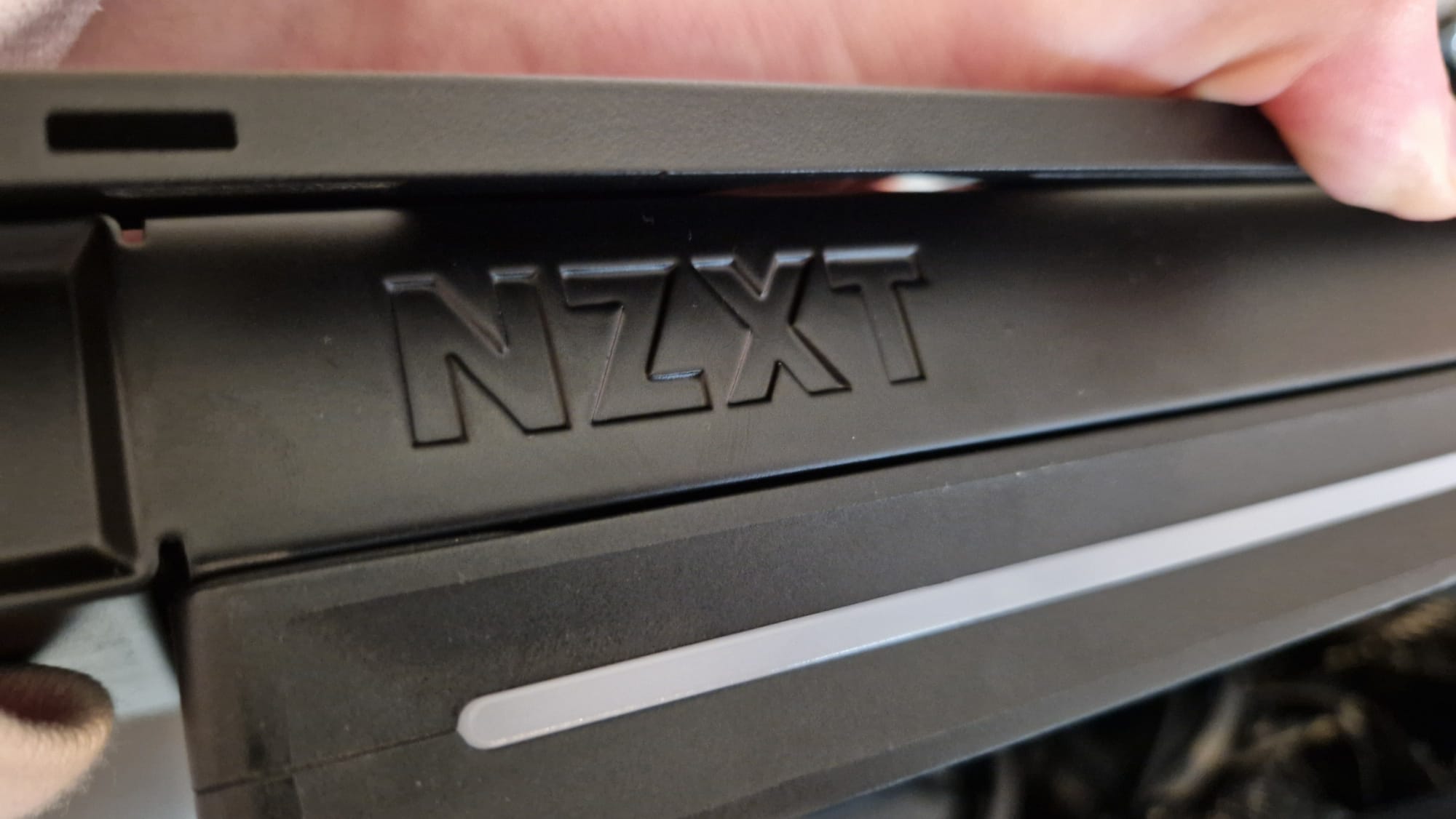 The NZXT logo on the side of the radiator for the NZXT Kraken Elite 360 RGB