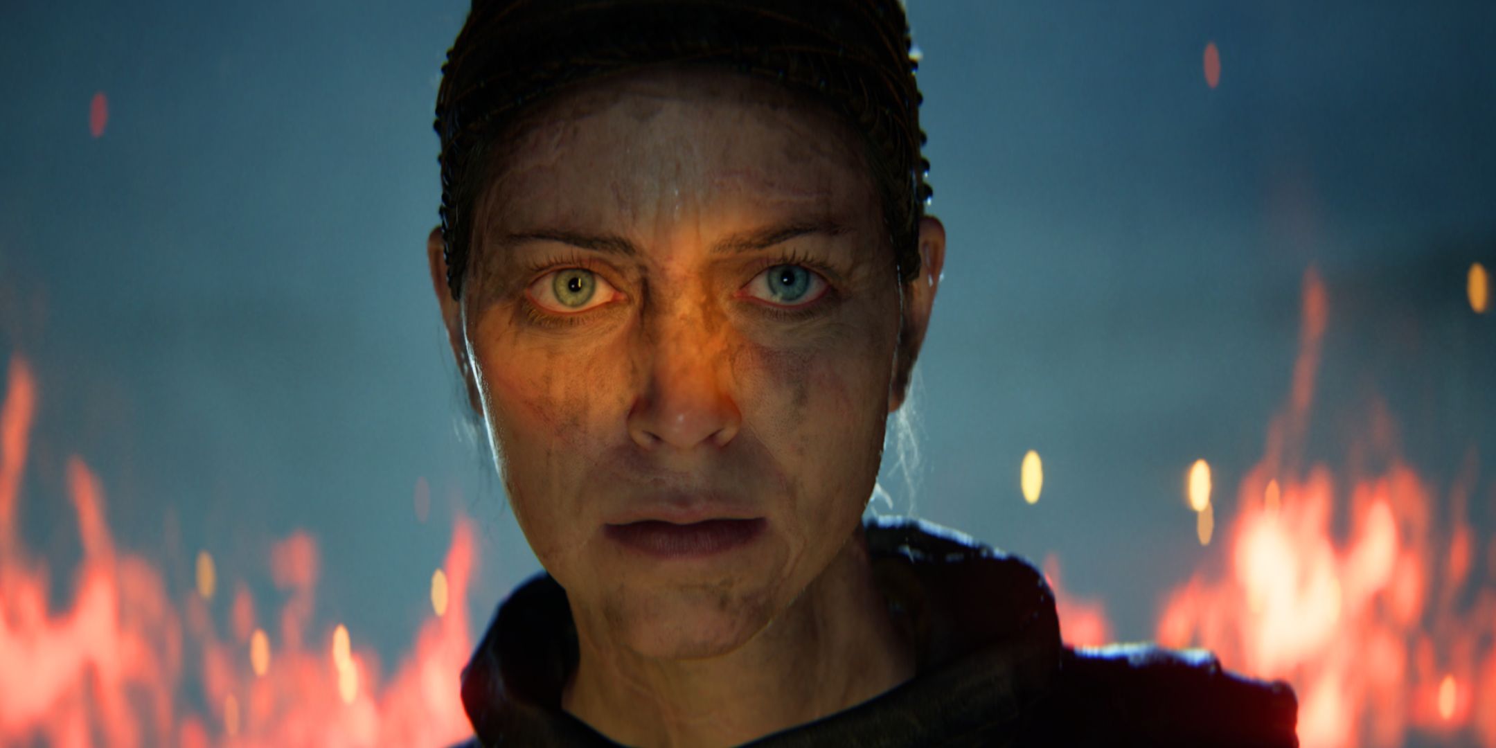 Senua's Saga Hellblade 2 Senua Grimacing Front Of Flames