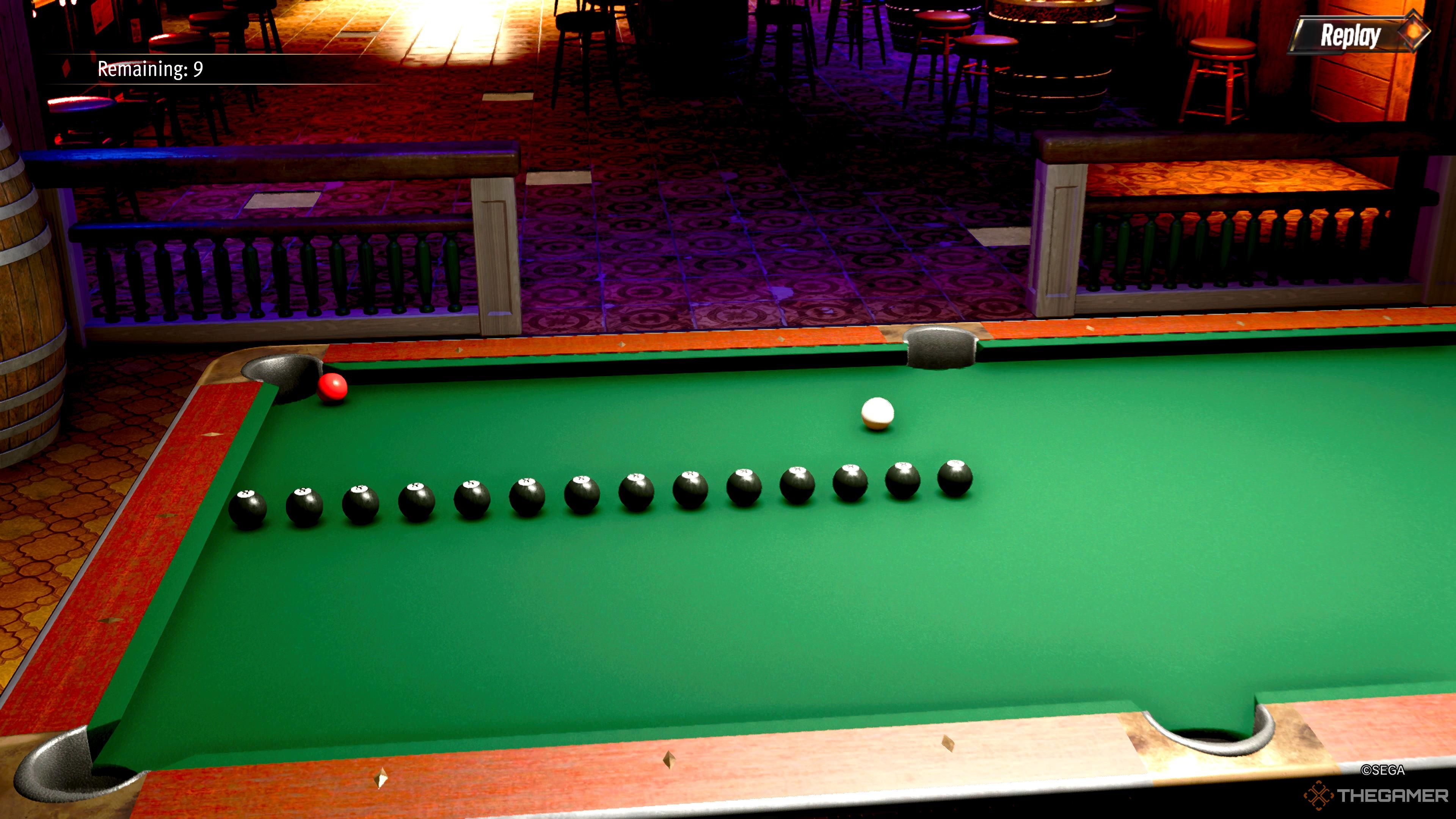 Shooting the cue ball around a wall of eight-balls in Like A Dragon Pirate Yakuza in Hawaiii.