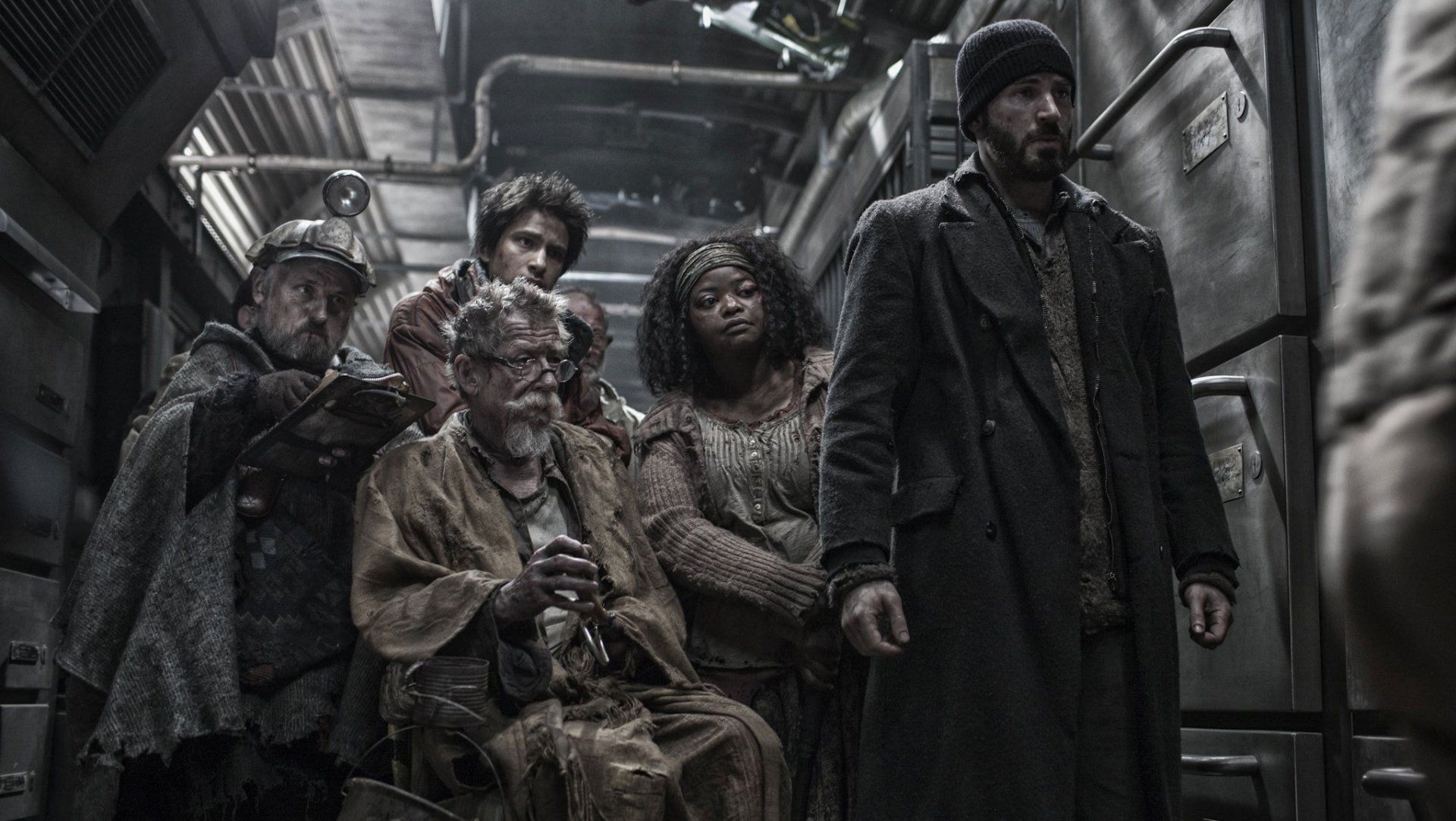 Snowpiercer image of Chris Evans with other characters.