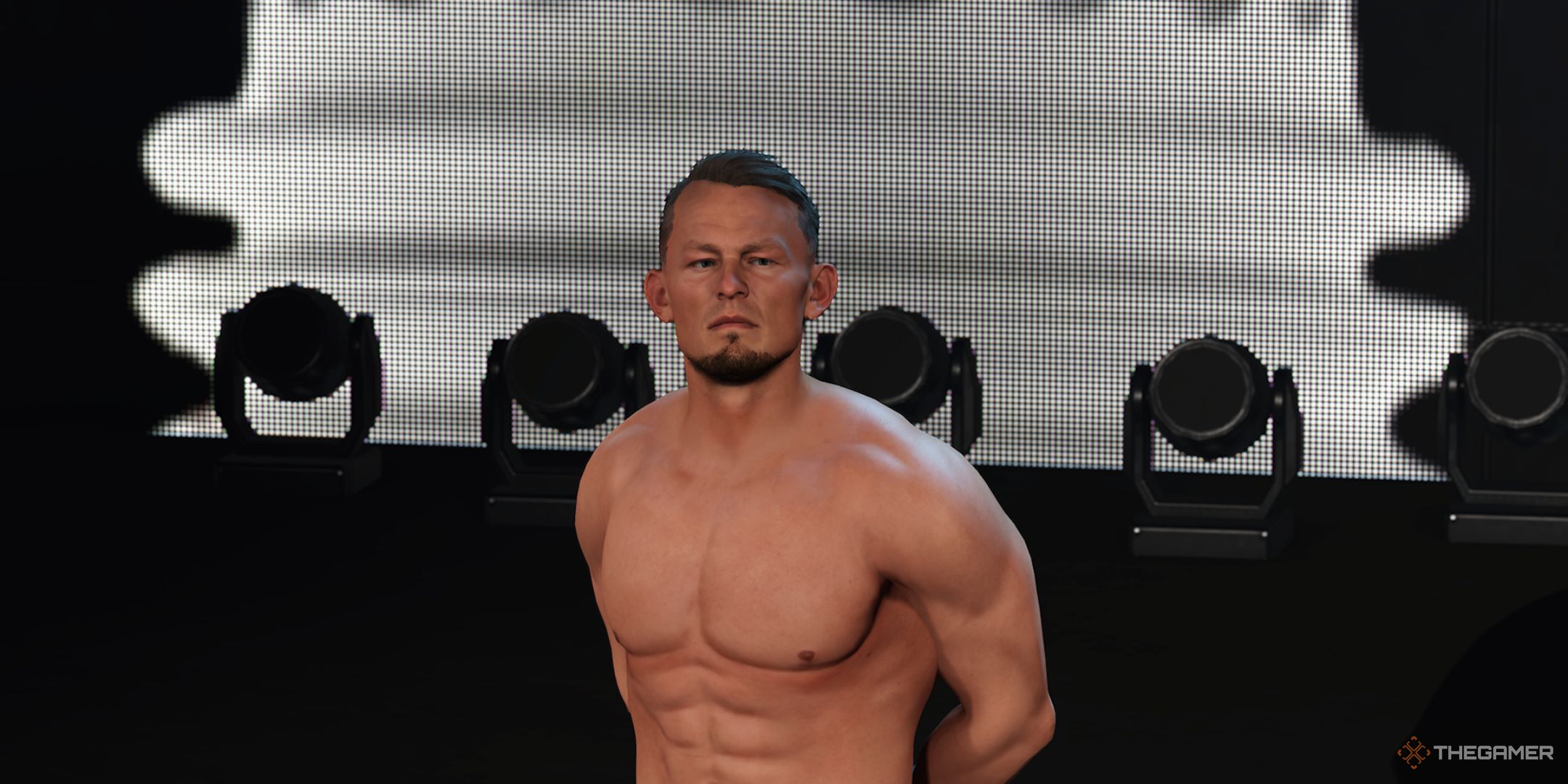 WWE 2K25 screenshot of Ludwig Kaiser with his arms behind his back.