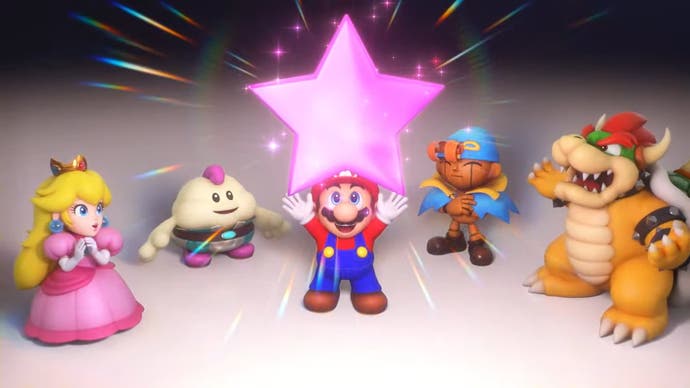 Super Mario RPG - Mario holds up a star while Peach, Mallow, Geno and Bowser look on.