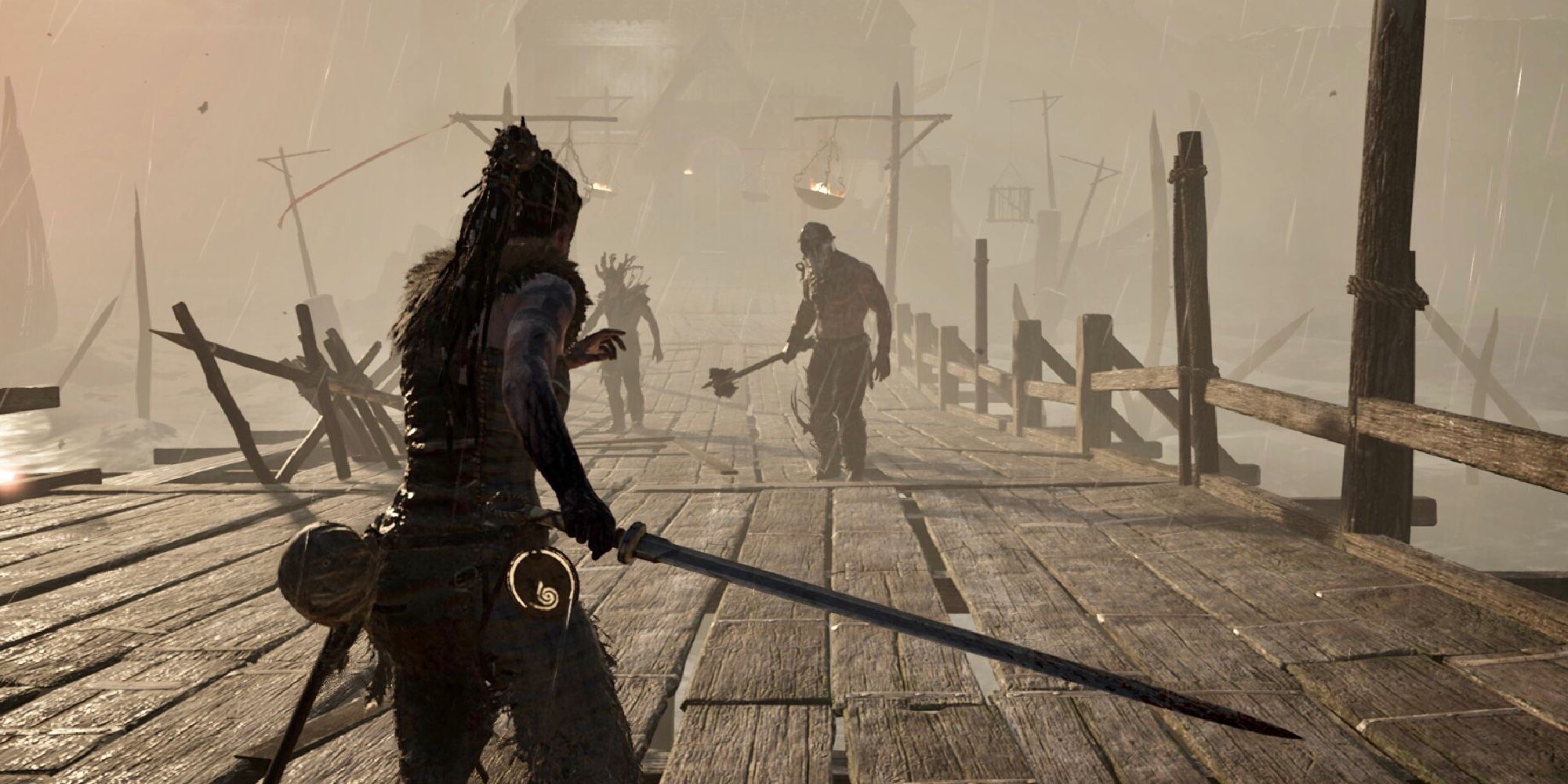 Senua Focuses On The Greatest Threat In Battle On The Bridge To Helheim In Hellblade: Senua’s Sacrifice
