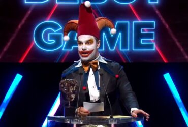 Ben starr dressed as jimbo the joker on the bafta podium accepting an award for balatro