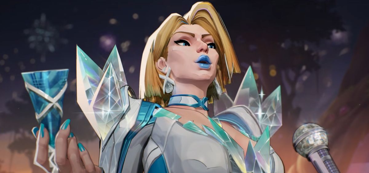 emma frost holding a drink and giving a toast in a frosty gown