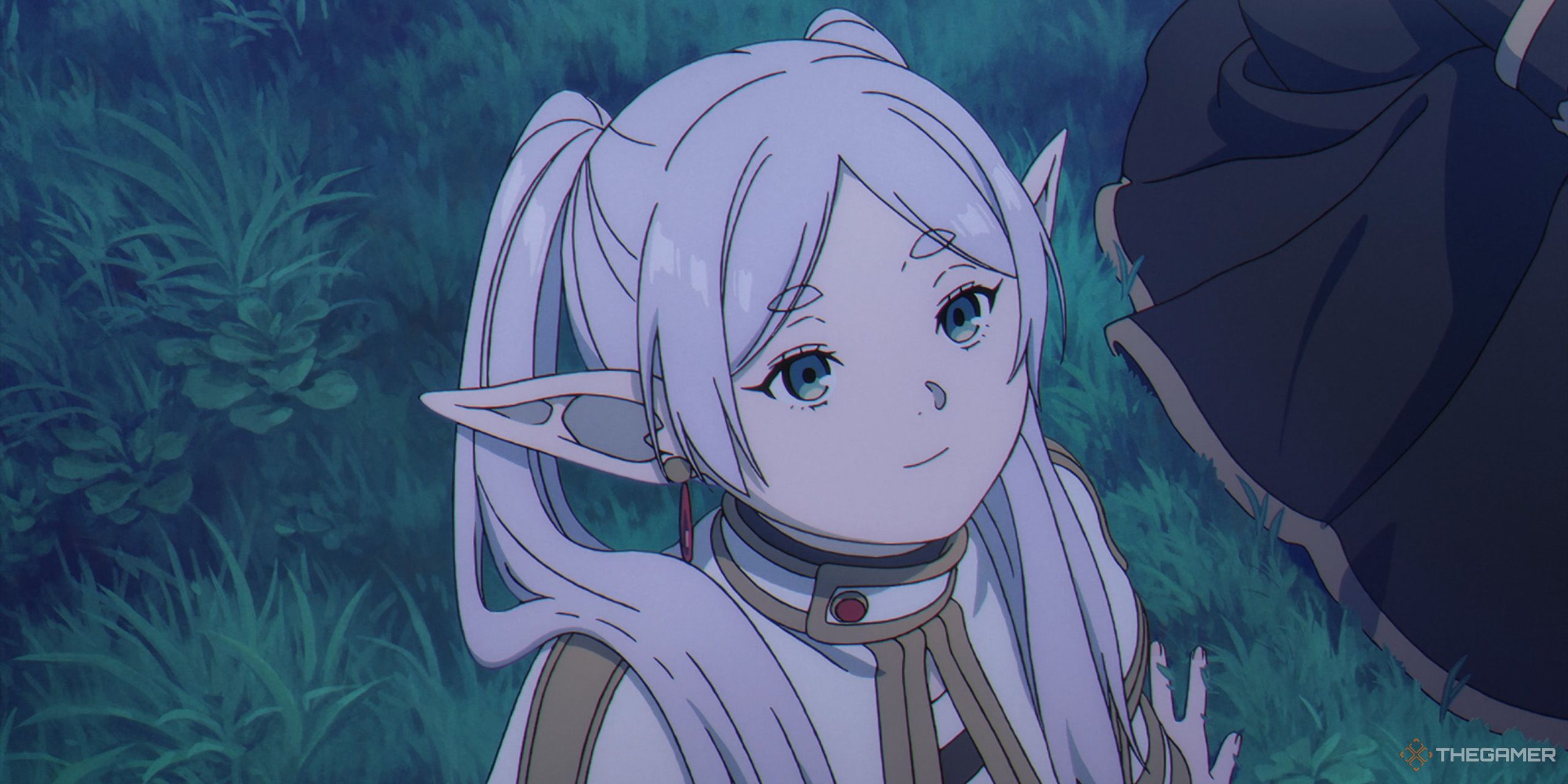 A close-up of Frieren smiling in Frieren: Beyond Journey's End.