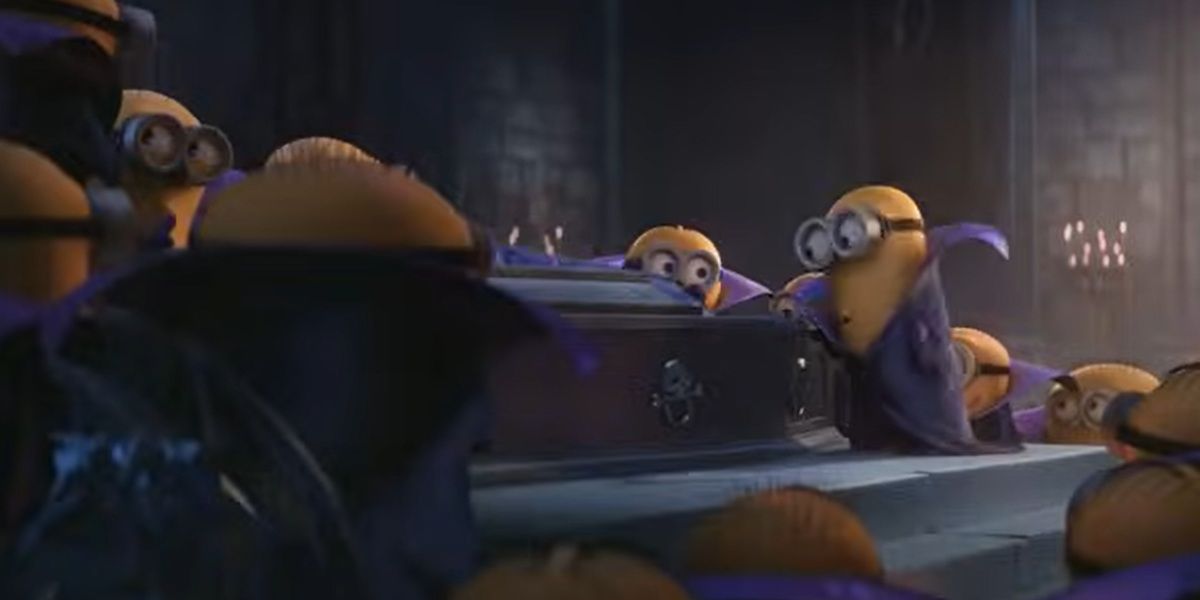 Minions crowded around a coffin in Minions.