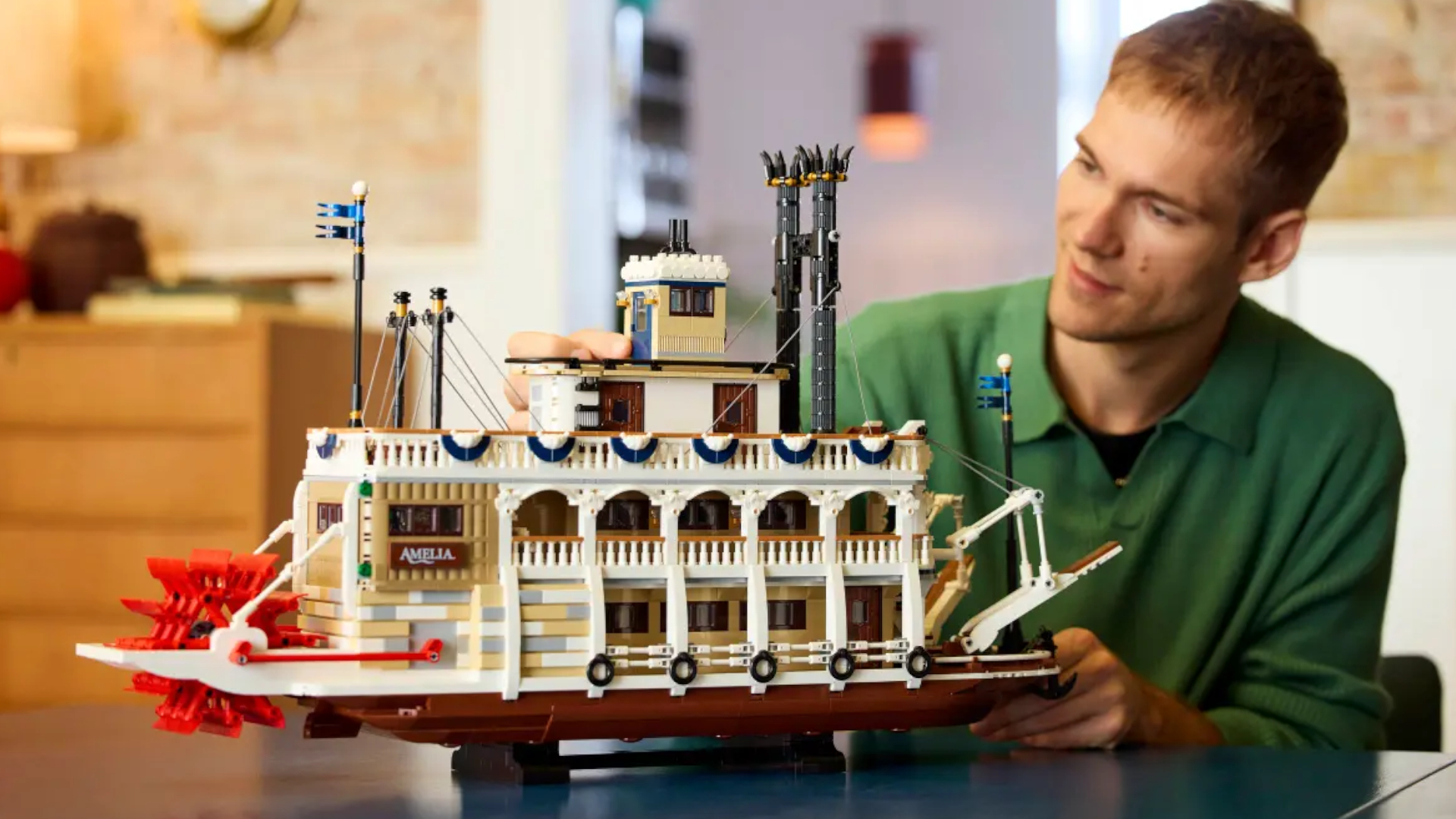 A man admiring the Lego River Steamboat set