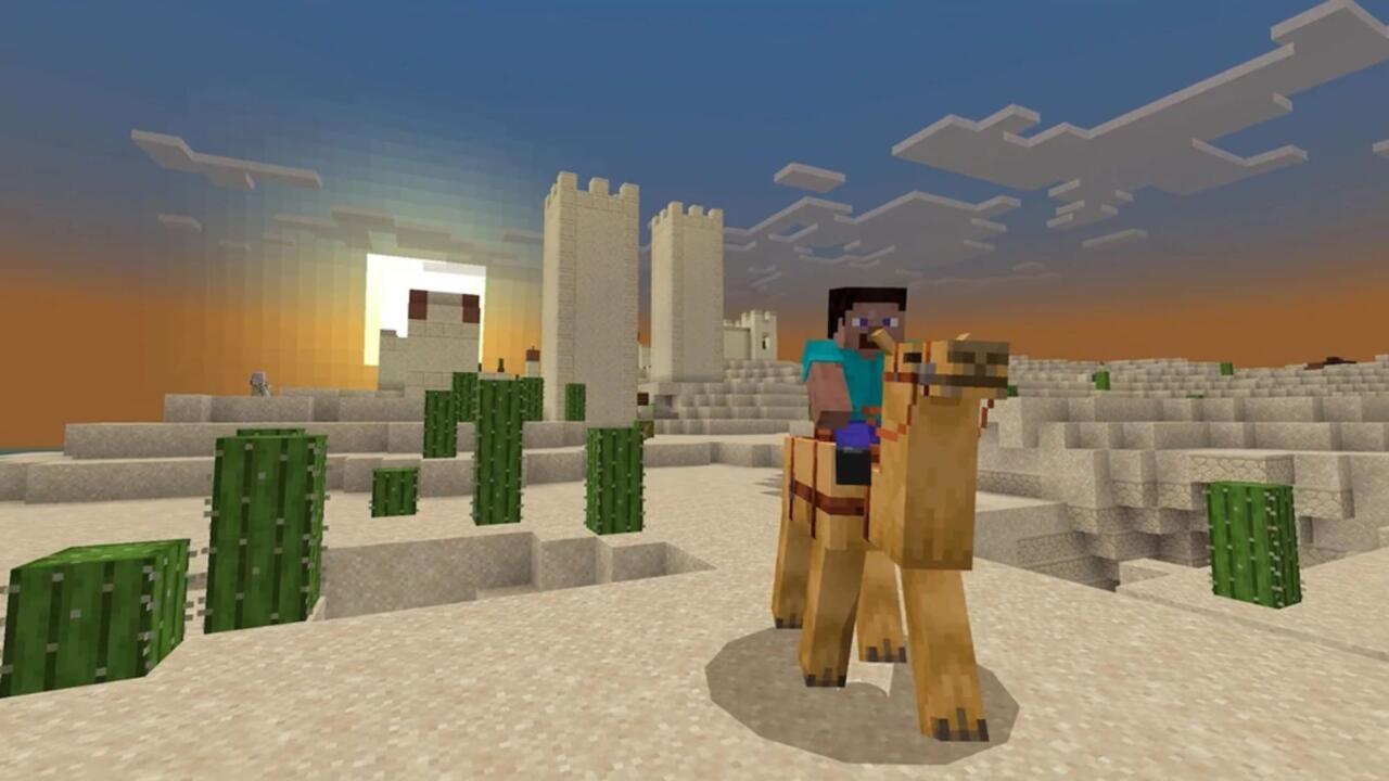 Riding a camel through the desert.