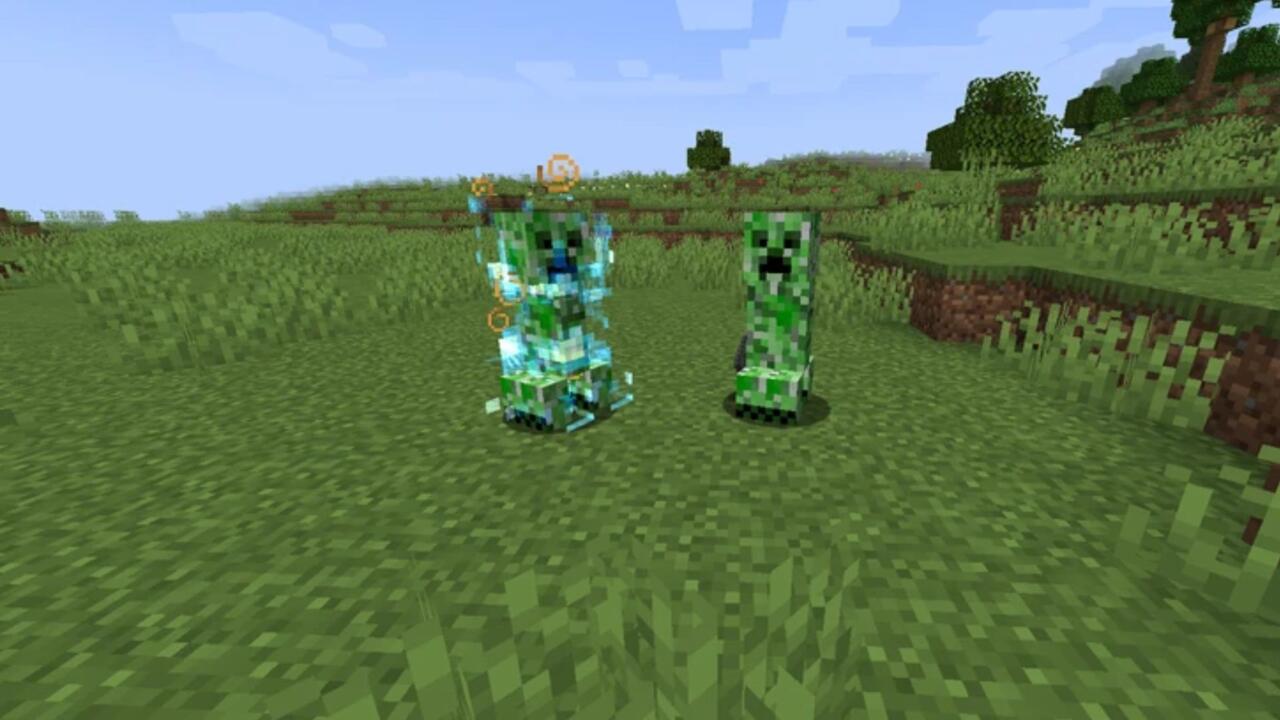 A charged Creeper next to a regular one