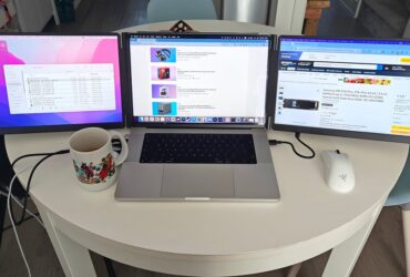 Tools of the trade: a triple screen laptop is how I'm covering Amazon's Prime Day sales