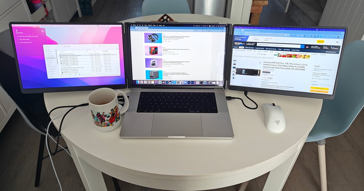 Tools of the trade: a triple screen laptop is how I'm covering Amazon's Prime Day sales