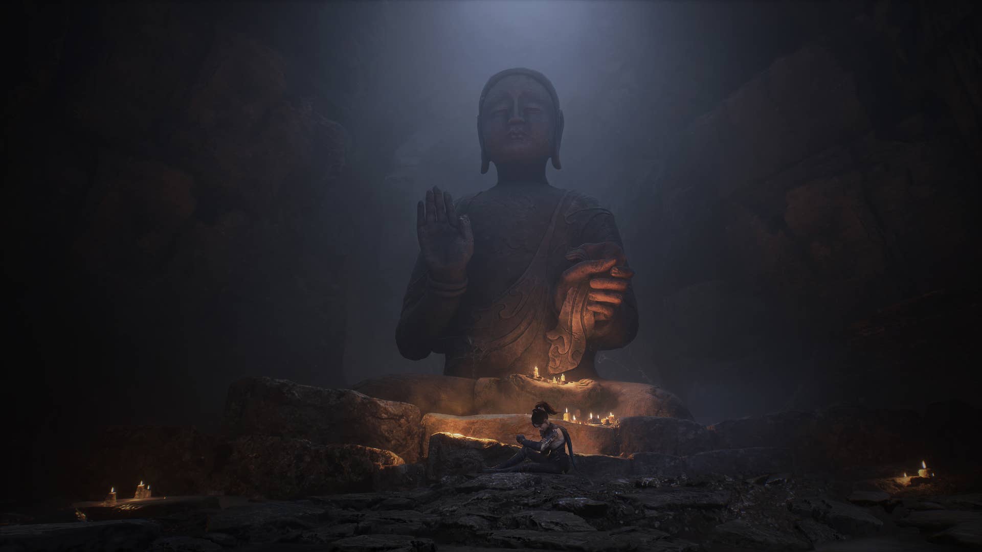 Wuchang can be seen waking up in front of a large Buddha Statue near the Buddha Cliffs in WUCHANG: Fallen Feathers