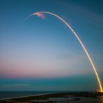 SpaceX launch across a skyline