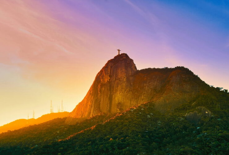 The famous statue Christ the Redeemer atop the mountain Rio