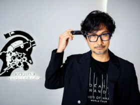 Hideo Kojima holds the Death Stranding harmonica
