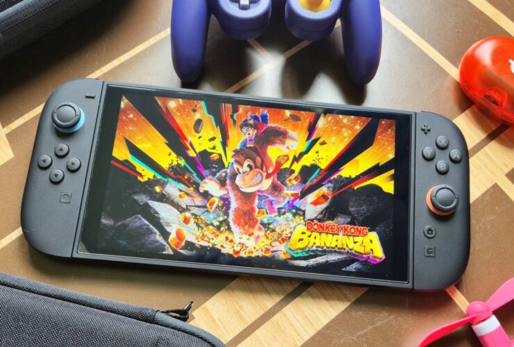 Photo by Rosalie Newcombe of the Nintendo Switch 2 sitting on a coffee table surrounded by accessories.