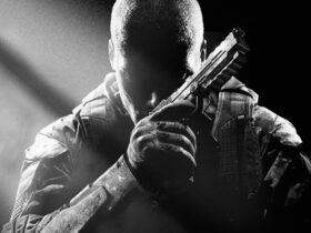 Key art for Call of Duty Black Ops 2 showing a character sitting in darkness with a handgun, from Edge 353
