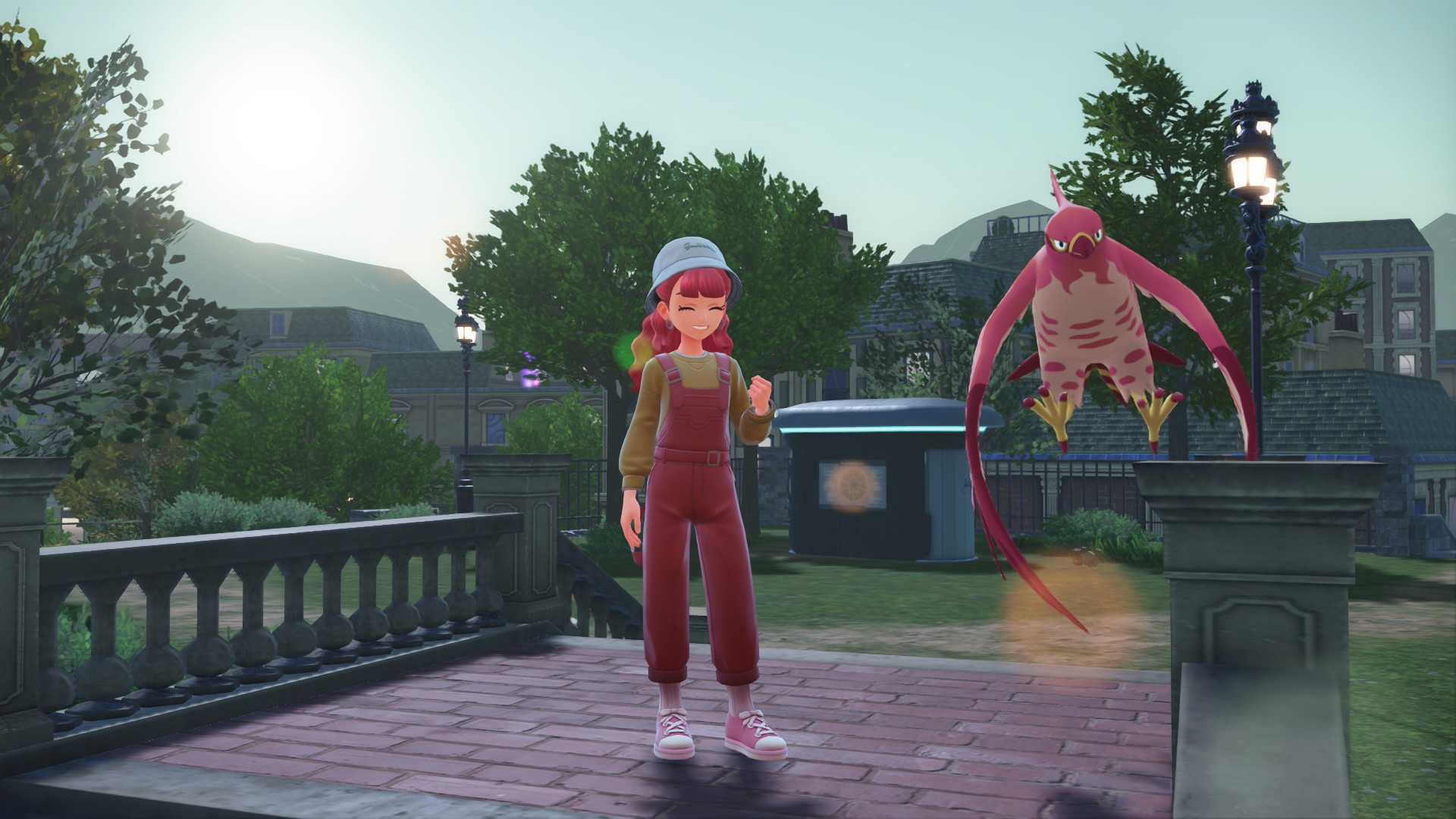 A pink-haired trainer stood next to a shiny Talonflame in Pokemon Legends: Z-A.