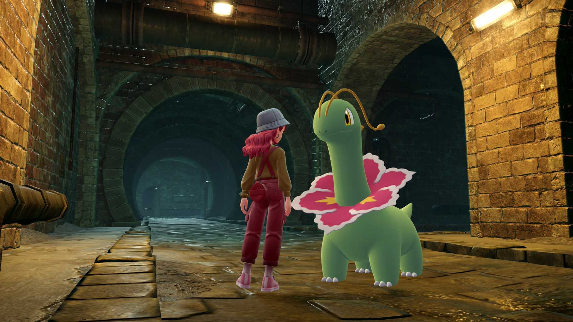 A Pokemon Legends: Z-A screenshot shows a pink-haired trainer and a Meganium stood in the Lumiose Sewers.