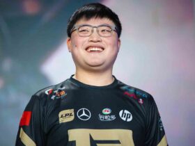 Uzi smiling at League of Legends event while playing for RNG