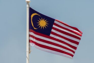 malaysia flag flying in wind