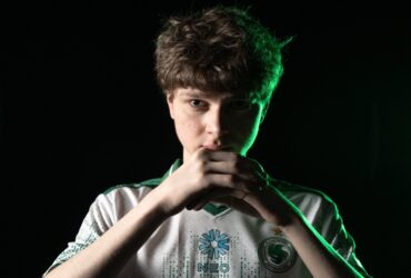 Kyousuke posing for Team Falcons photoshoot