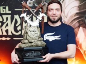 Korb3n holding PGL Wallachia Dota 2 trophy