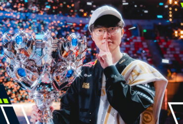 T1 team celebrates their League of Legends LCK championship victory on stage with the trophy