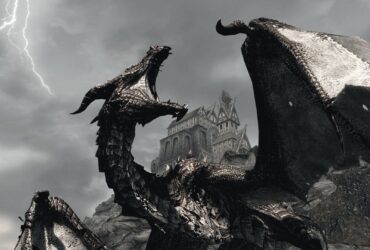 A black dragon roaring with a manor house behind it and lighting in the sky during Skyrim.